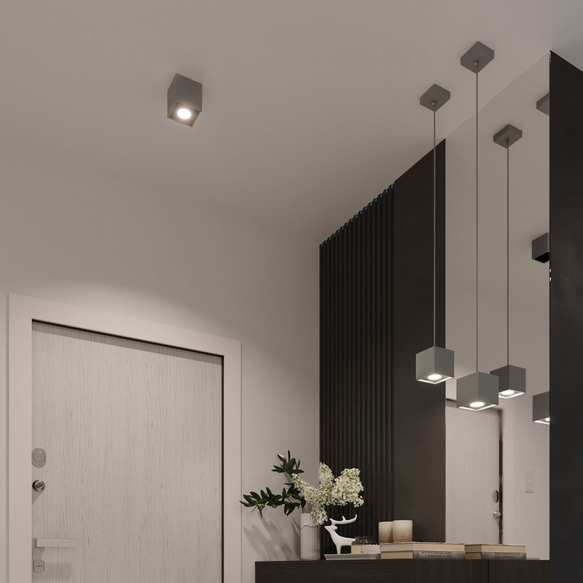 Modern grey cube wall lamp mounted on ceiling illuminating contemporary interior with minimalist decor