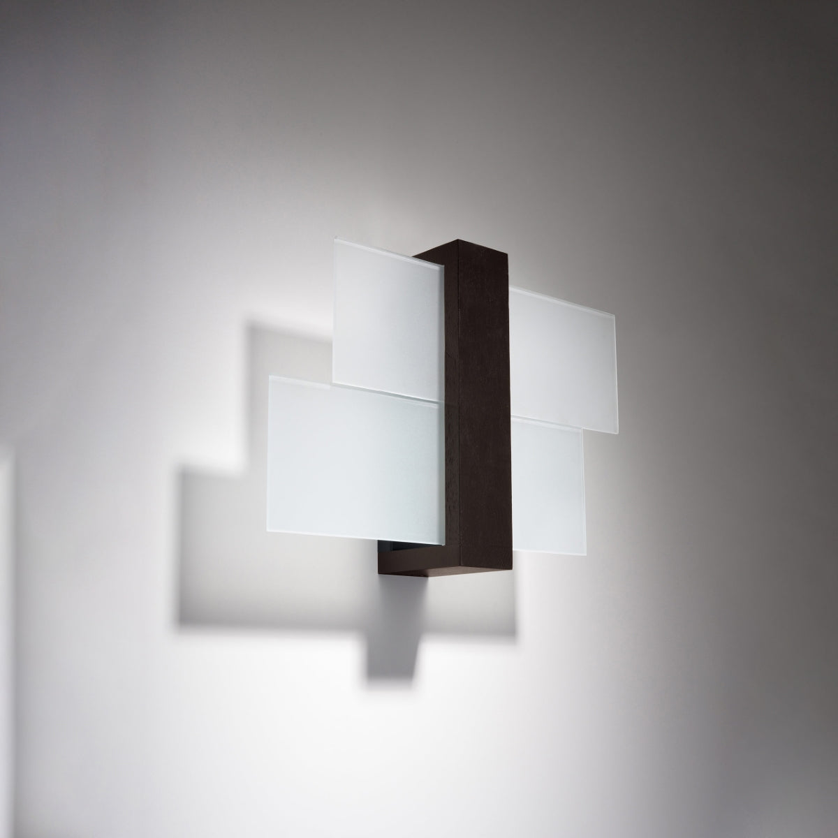 Sollux Lighting FENIKS 1 wall lamp for living room. Modern dark rectangular mount with layered frosted glass panels