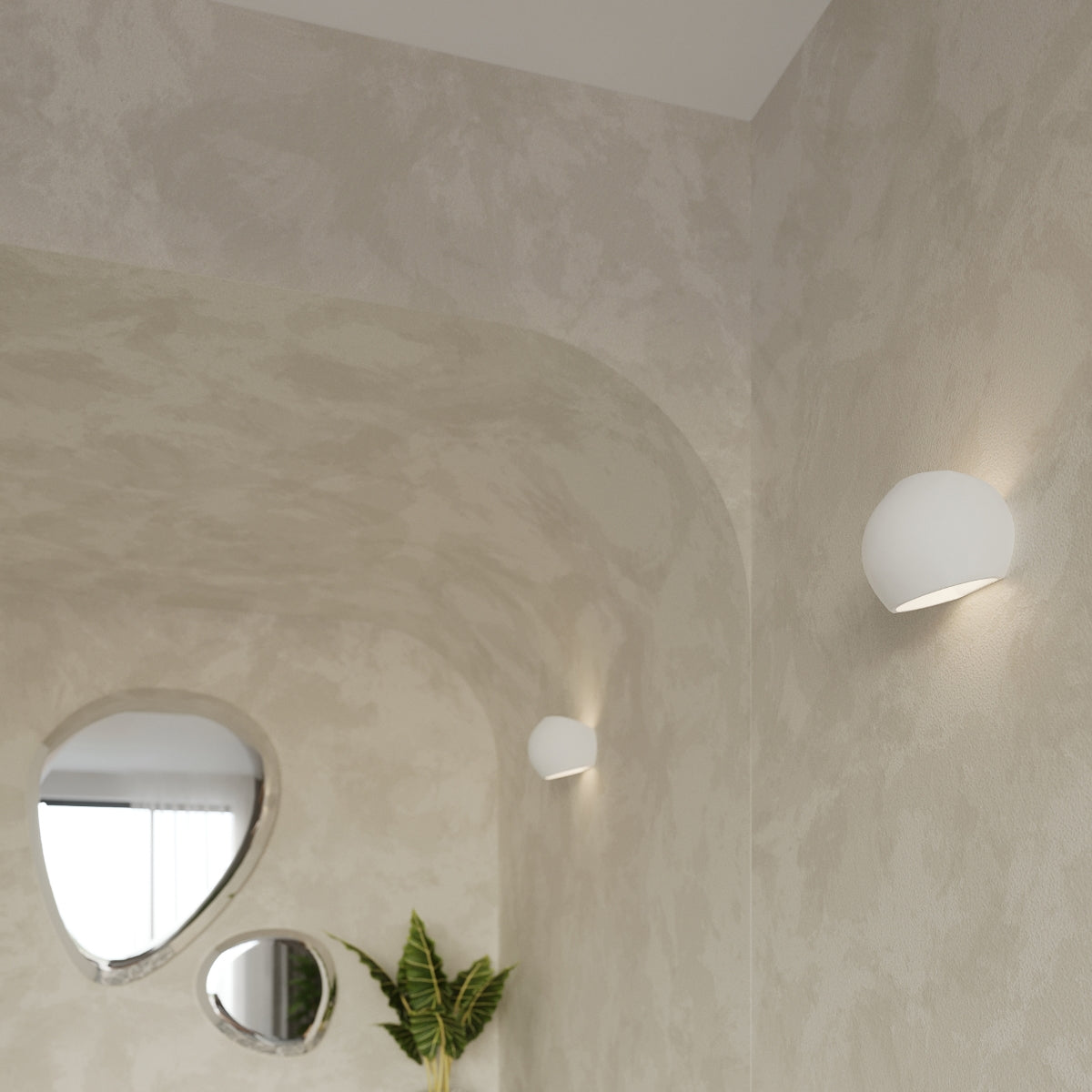 Sollux Lighting modern ceramic wall lamp in white mounted on beige textured wall with arched ceiling