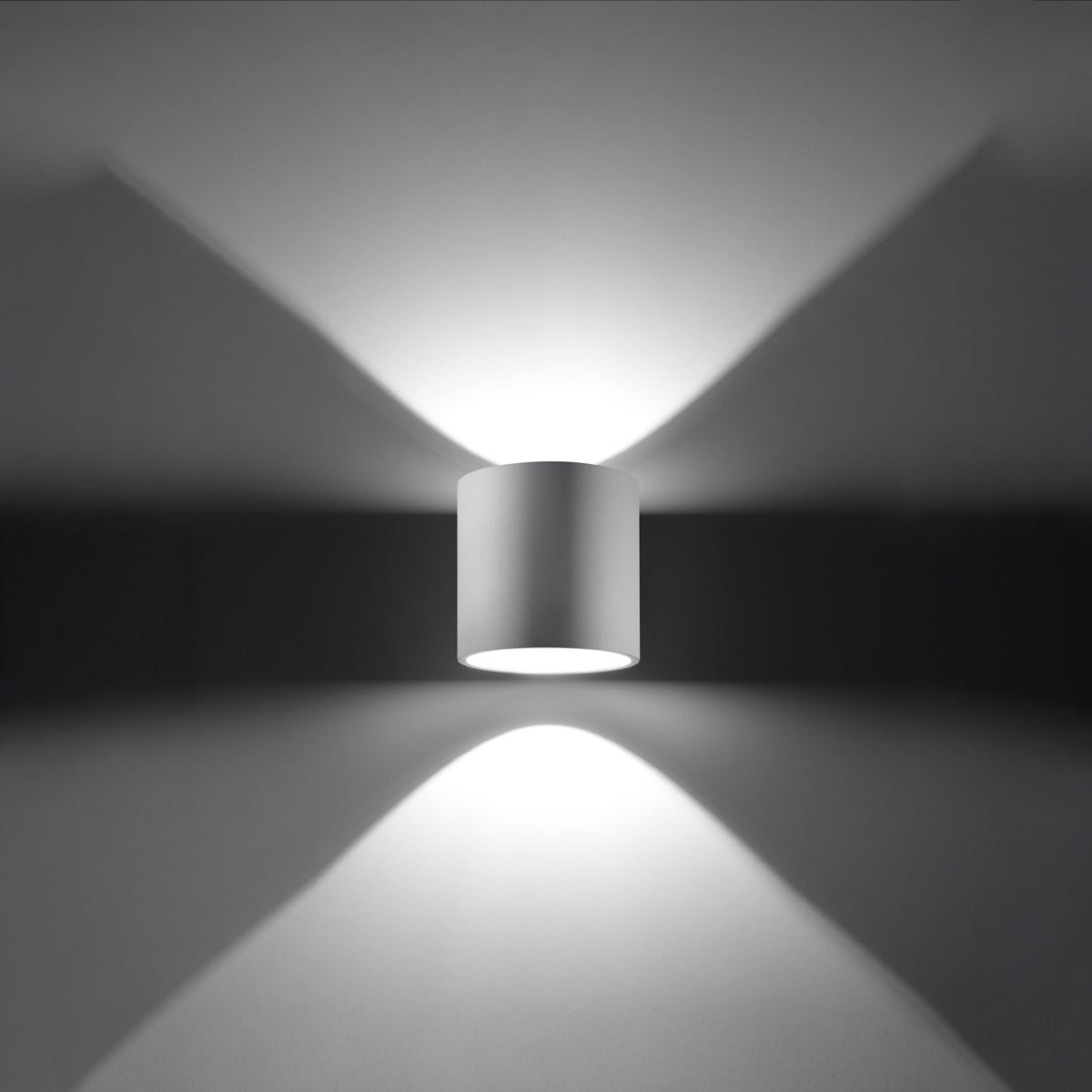 ORBIS 1 wall lamp by Sollux Lighting emits stylish upward and downward light with modern cylindrical design