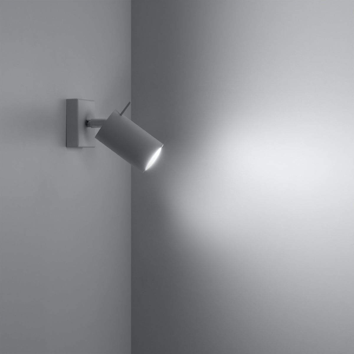 RING White Minimalist Wall Lamp providing sleek lighting in a modern interior setting