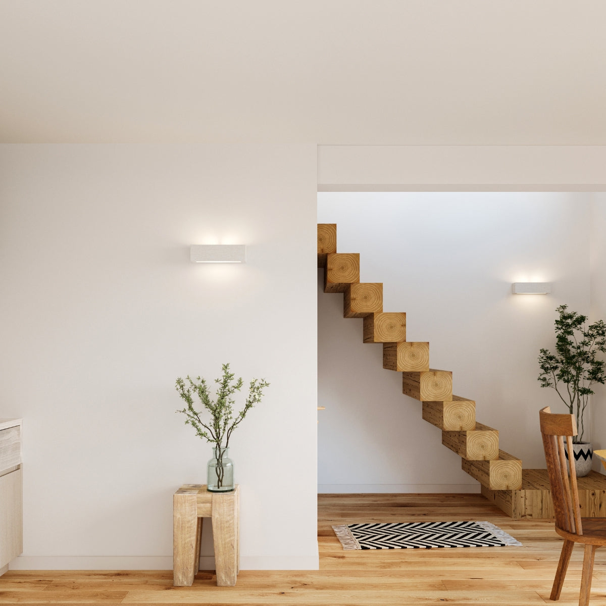 Minimalist modern interior featuring VEGA ceramic wall sconce from Sollux Lighting illuminating a wooden staircase and simple decor